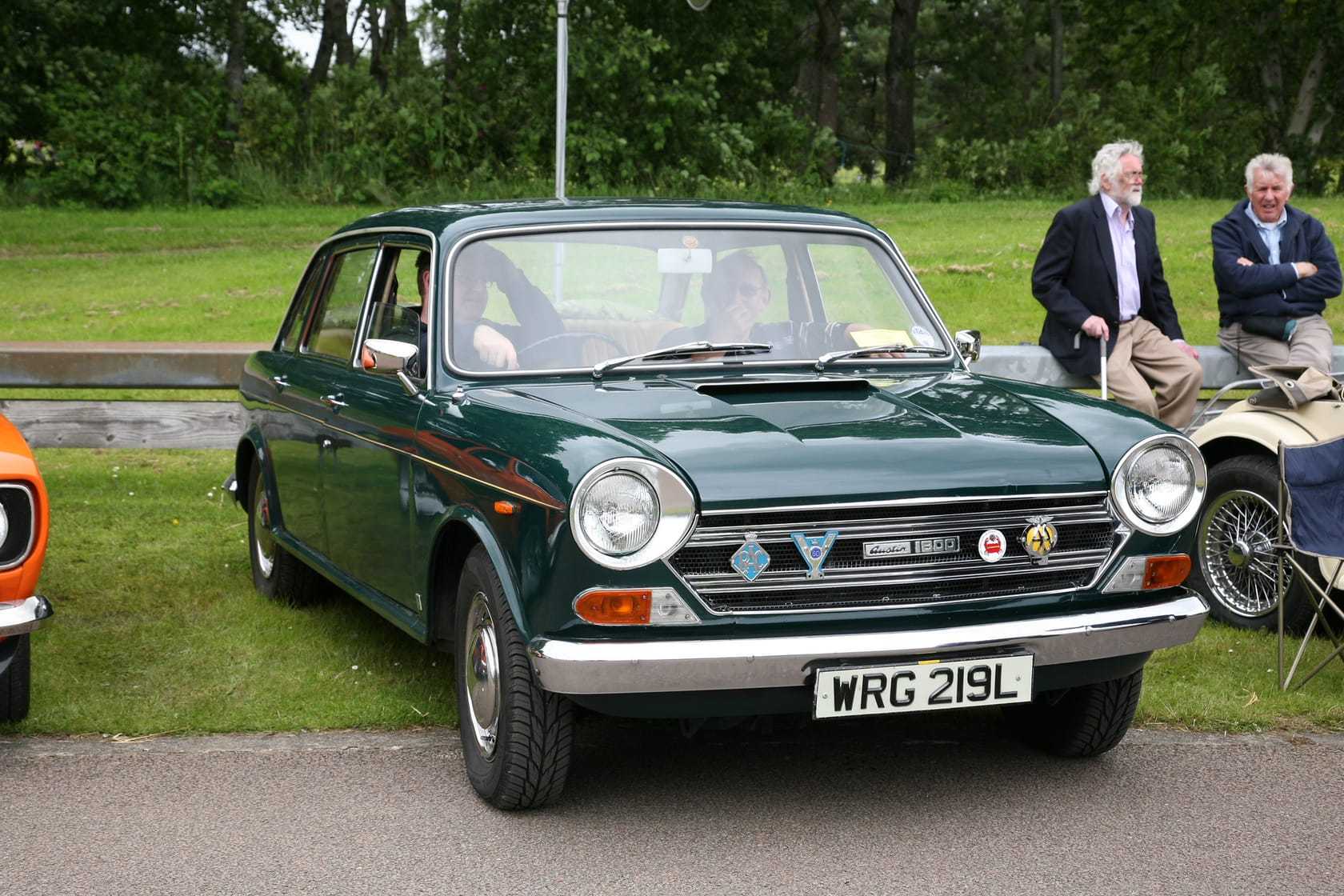 A dark green 1972 Austin 1800 at a classic car show, front three-quarter view, UK registration WRG 219L