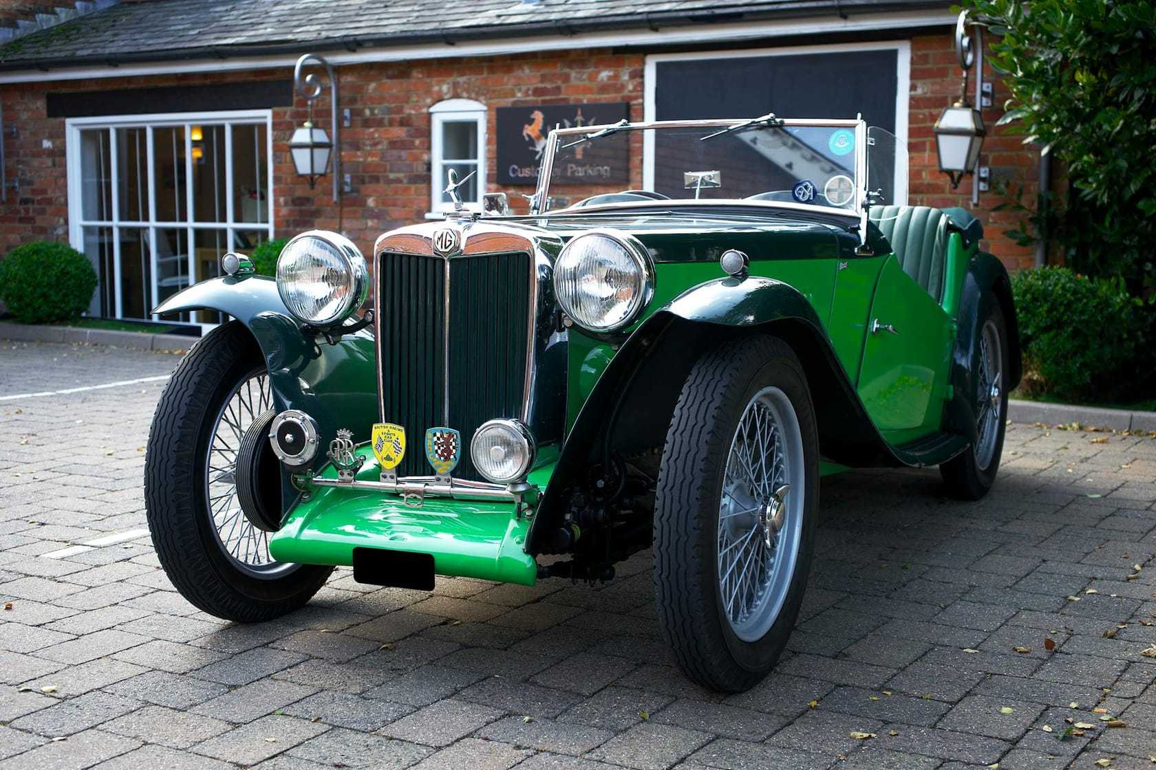 A green MG TC roadster, front three-quarter view