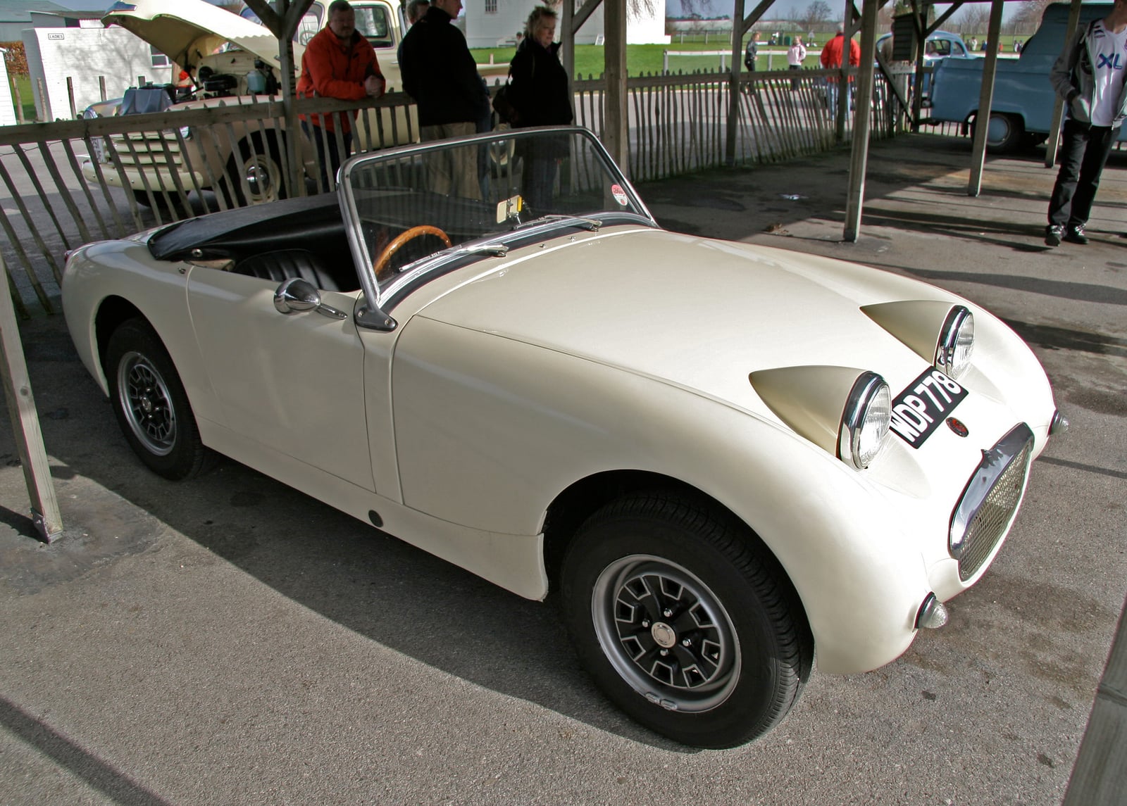 A cream Austin-Healey Frogeye Sprite Mk I, front three-quarter view