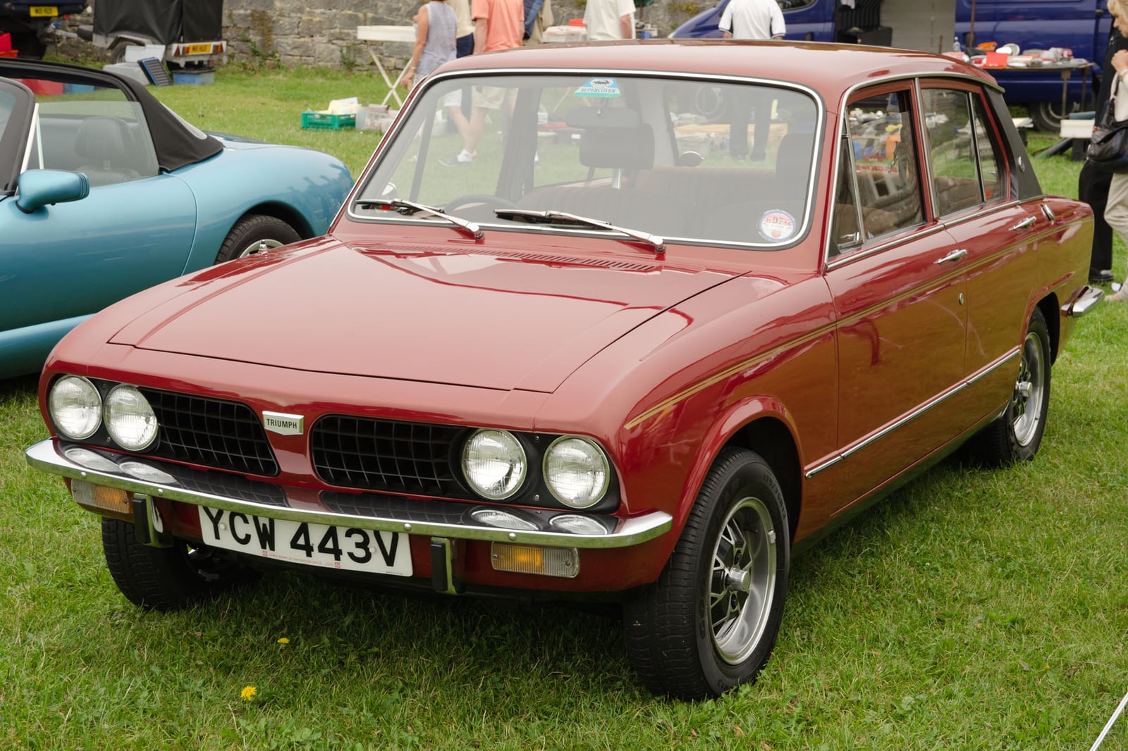 A yellow Triumph Dolomite 1500HL, front three-quarter view